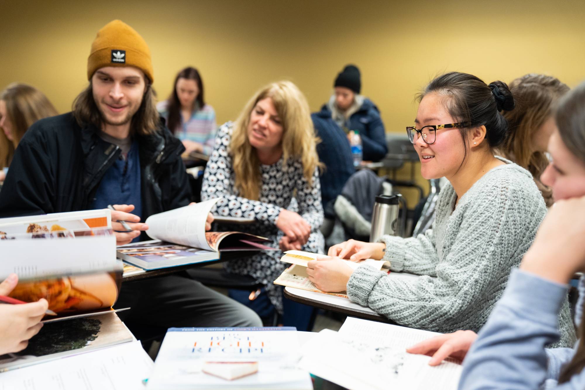 students and professor talking